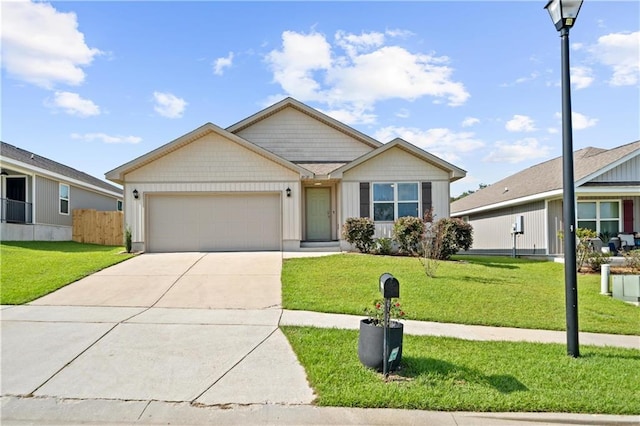 10520 Wales Ln, Spanish Fort, AL 36527 - view of front of property with a garage and concrete driveway