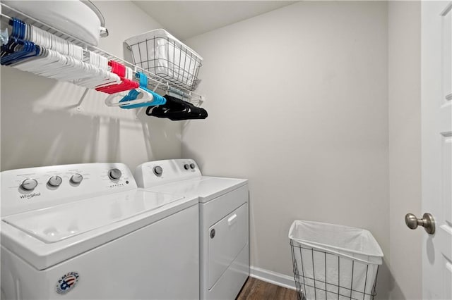 10520 Wales Ln, Spanish Fort, AL 36527 - washroom with washing machine and clothes dryer, baseboards, and dark wood-style flooring