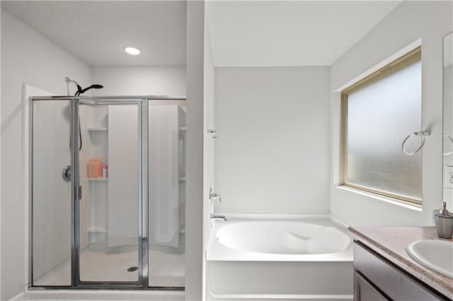 10520 Wales Ln, Spanish Fort, AL 36527 - full bath featuring a stall shower, a bath, and vanity