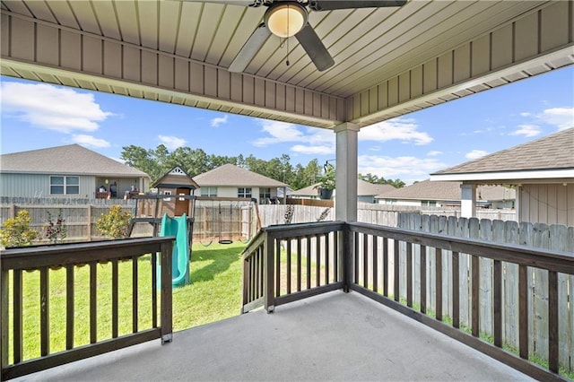 10520 Wales Ln, Spanish Fort, AL 36527 - view of patio featuring ceiling fan, a residential view, and a playground