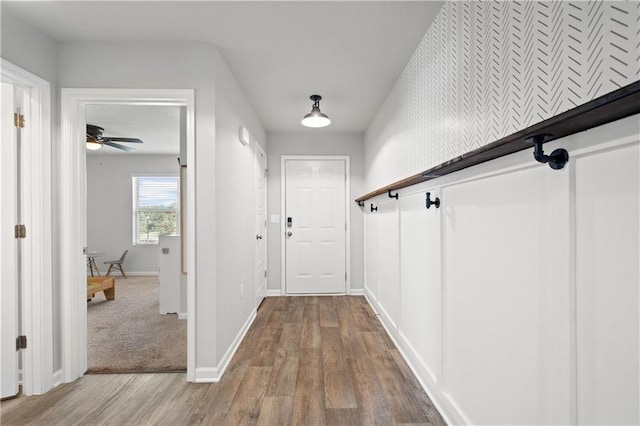 10520 Wales Ln, Spanish Fort, AL 36527 - doorway with wood finished floors, baseboards, and ceiling fan
