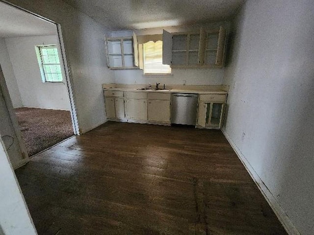 2805 Banks Ave, Mobile, AL 36617 - kitchen featuring stainless steel dishwasher, dark wood-type flooring, light countertops, and a textured ceiling