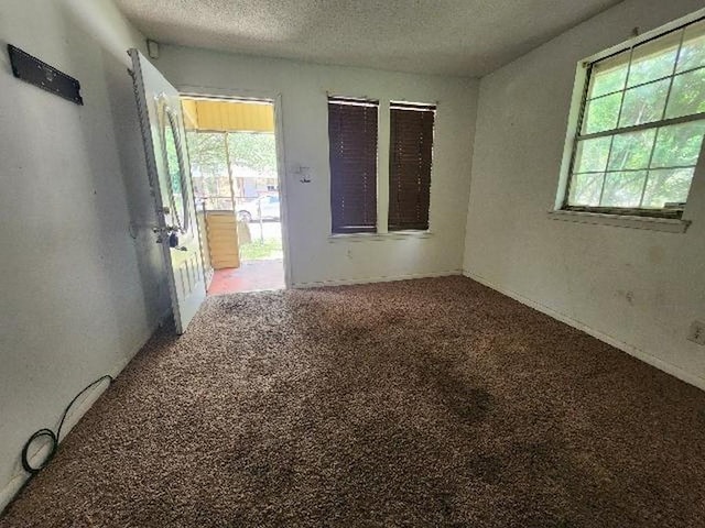 2805 Banks Ave, Mobile, AL 36617 - carpeted spare room with a textured ceiling