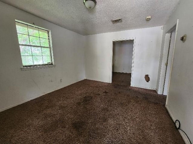 2805 Banks Ave, Mobile, AL 36617 - carpeted spare room with a textured ceiling