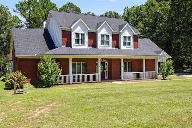 view of front of home featuring a porch and a front lawn