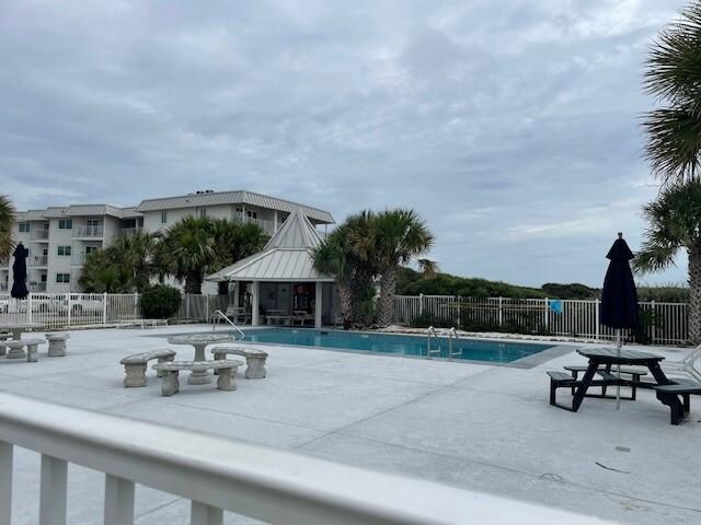 view of swimming pool with a gazebo and a patio area