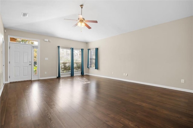 interior space featuring ceiling fan and dark wood-type flooring