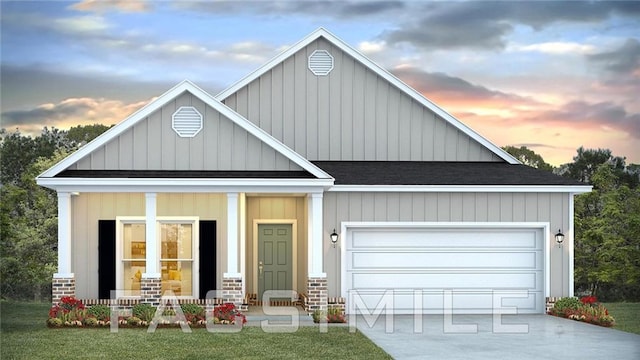 view of front facade with a yard, covered porch, and a garage