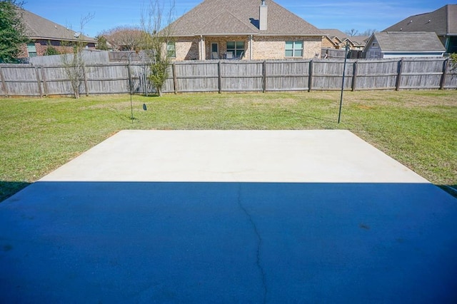 view of patio / terrace featuring fence