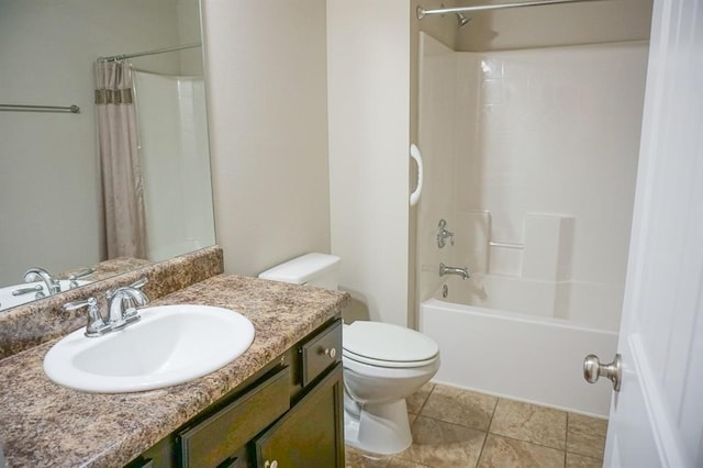 bathroom featuring tile patterned flooring, shower / tub combo with curtain, vanity, and toilet