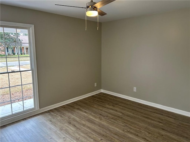 empty room with wood-type flooring and ceiling fan