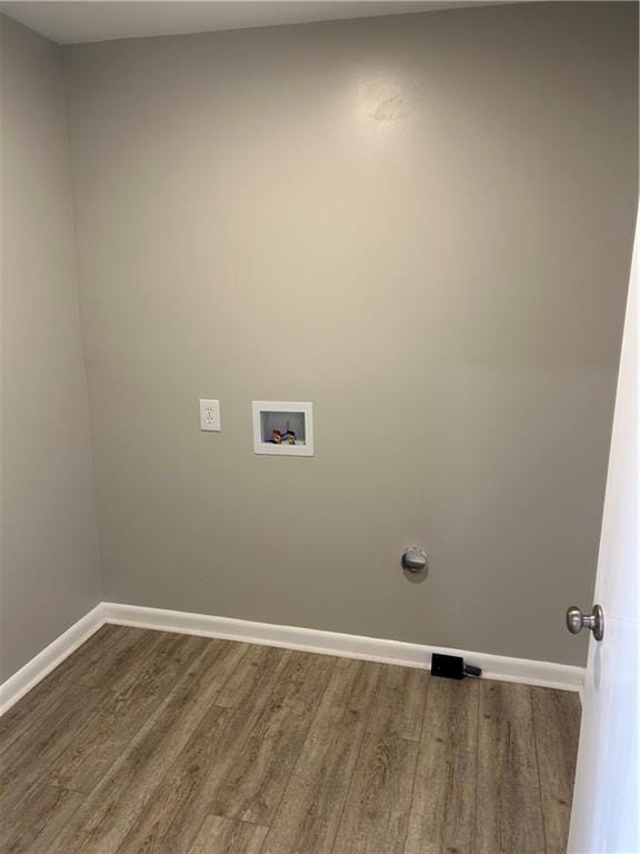 laundry area featuring hardwood / wood-style floors and hookup for a washing machine