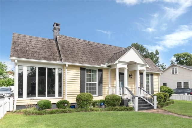 exterior space with a front lawn