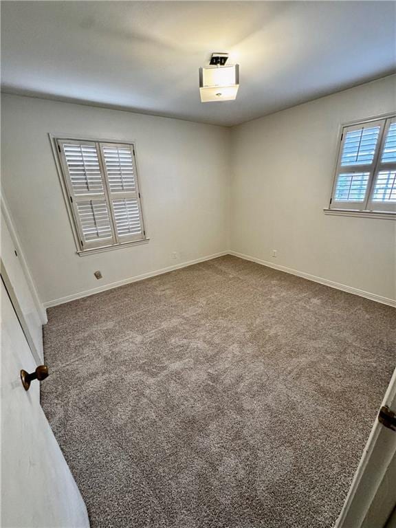 view of carpeted spare room