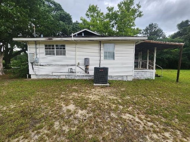 5320 Catherine Dr, Satsuma, AL 36572 - back of property featuring a yard and central AC