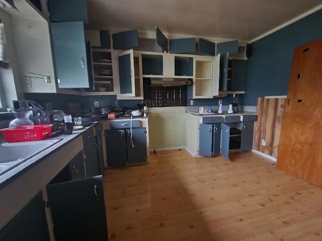 5320 Catherine Dr, Satsuma, AL 36572 - kitchen with open shelves and light wood-type flooring