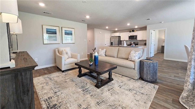 living room with hardwood / wood-style flooring