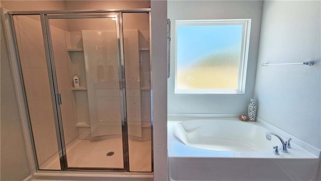 bathroom featuring plus walk in shower