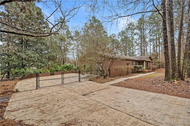 exterior space with fence and a gate