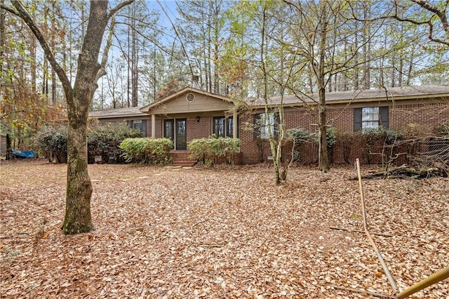 ranch-style home with brick siding