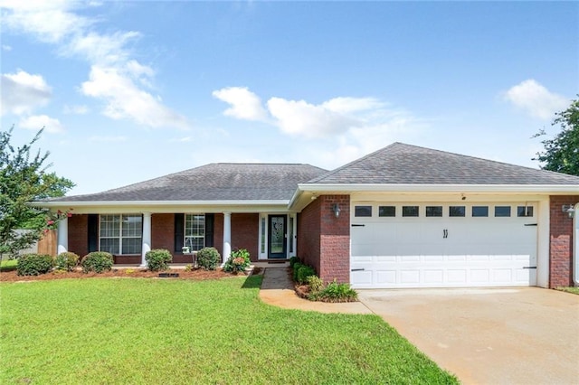 10234 Scott Plantation Dr N, Mobile, AL 36695 - single story home with an attached garage, brick siding, driveway, a front lawn, and a shingled roof
