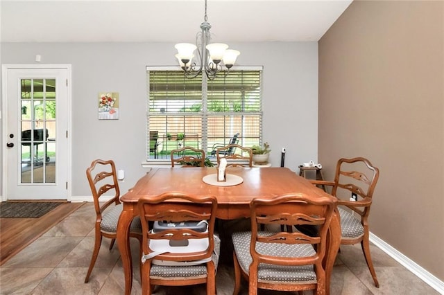 10234 Scott Plantation Dr N, Mobile, AL 36695 - dining room featuring a chandelier and baseboards