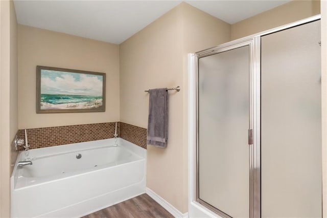 10234 Scott Plantation Dr N, Mobile, AL 36695 - bathroom with wood finished floors, a shower stall, and a bath