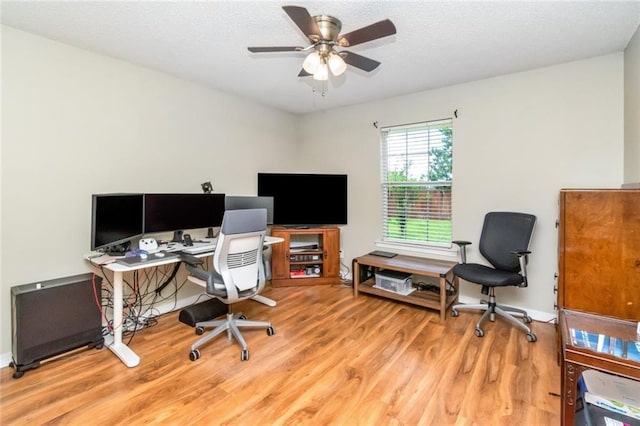10234 Scott Plantation Dr N, Mobile, AL 36695 - home office featuring wood finished floors, a ceiling fan, and a textured ceiling