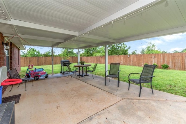 10234 Scott Plantation Dr N, Mobile, AL 36695 - fenced backyard with a patio area and outdoor dining area