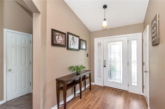 10234 Scott Plantation Dr N, Mobile, AL 36695 - foyer with lofted ceiling, plenty of natural light, and light wood finished floors