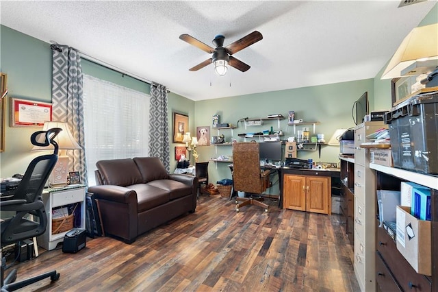 office space featuring a ceiling fan and dark wood-style flooring