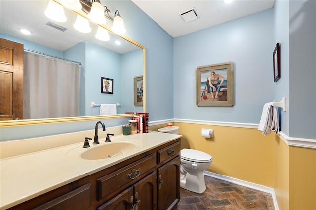 full bathroom with baseboards, visible vents, brick floor, and toilet