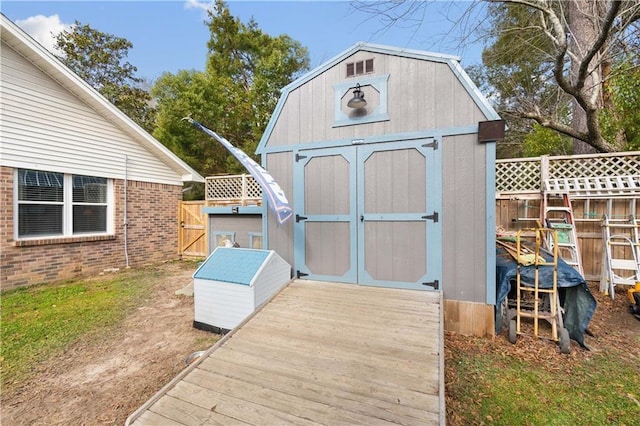 view of shed with a fenced backyard
