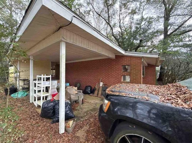 view of property exterior featuring a carport