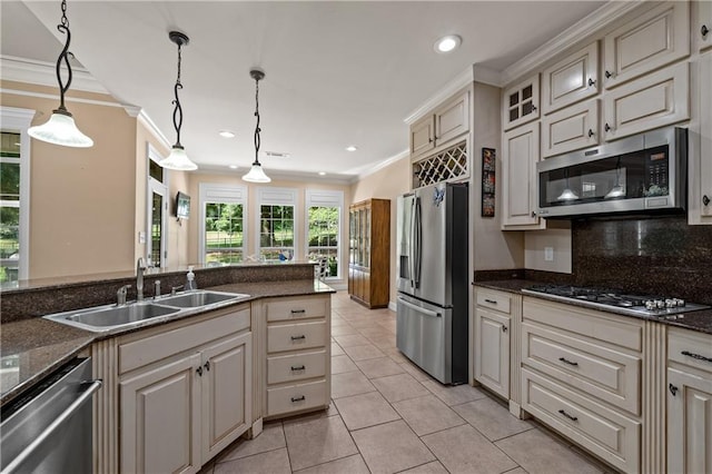 9791 Aspen Cir, Daphne, AL 36527 - kitchen featuring stainless steel appliances, decorative light fixtures, crown molding, light tile patterned flooring, and recessed lighting