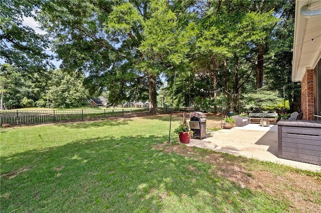 9791 Aspen Cir, Daphne, AL 36527 - fenced backyard with a patio and view of wooded area