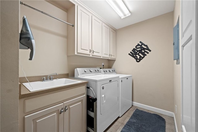 9791 Aspen Cir, Daphne, AL 36527 - laundry area with separate washer and dryer, cabinet space, light tile patterned floors, and electric panel