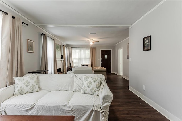 living room featuring crown molding, ceiling fan, and dark hardwood / wood-style flooring