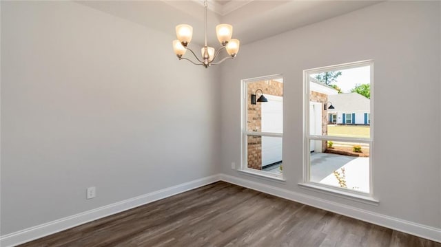 9836 Nadine Ln S, Mobile, AL 36695 - unfurnished room with dark wood-style floors, a chandelier, and ornamental molding