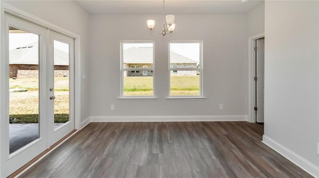 9836 Nadine Ln S, Mobile, AL 36695 - unfurnished dining area featuring a chandelier and dark wood finished floors