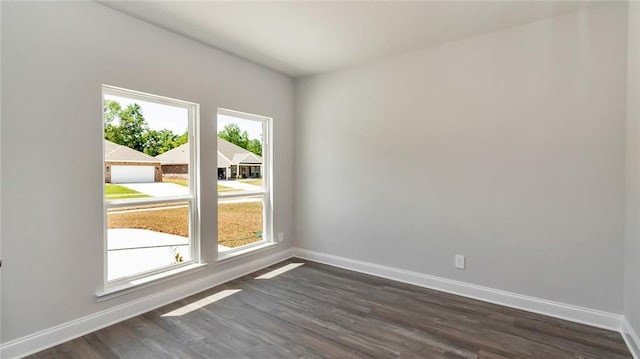 9836 Nadine Ln S, Mobile, AL 36695 - spare room featuring baseboards and dark wood-type flooring