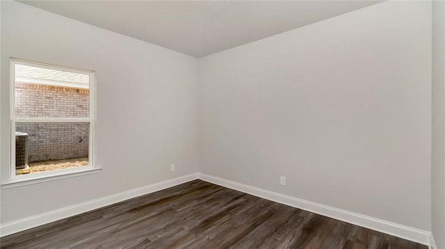 9836 Nadine Ln S, Mobile, AL 36695 - unfurnished room featuring baseboards and dark wood-style flooring