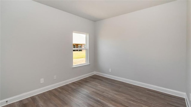 9836 Nadine Ln S, Mobile, AL 36695 - spare room featuring baseboards and dark wood finished floors
