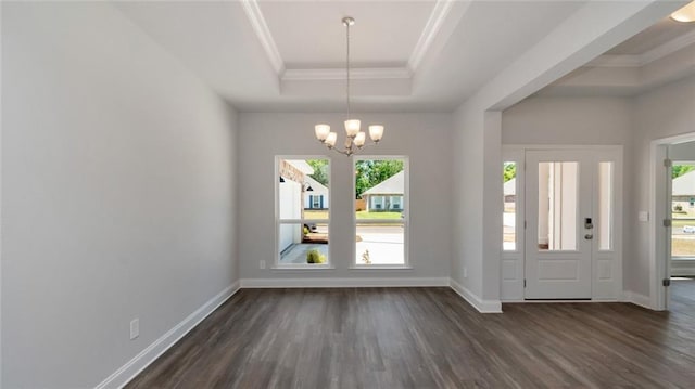 9836 Nadine Ln S, Mobile, AL 36695 - foyer entrance featuring a tray ceiling, a chandelier, crown molding, and dark wood-style flooring