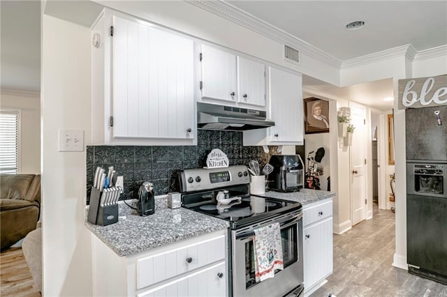 kitchen featuring crown molding, white cabinetry, stainless steel electric stove, and tasteful backsplash