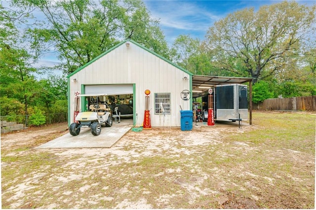 view of outbuilding featuring a garage