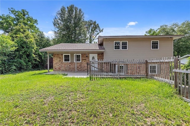 703 Townsend Cir, Chickasaw, AL 36611 - back of property featuring brick siding and a patio
