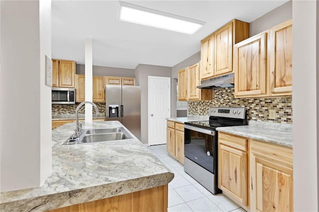 703 Townsend Cir, Chickasaw, AL 36611 - kitchen with stainless steel appliances, under cabinet range hood, a sink, light brown cabinets, and decorative backsplash