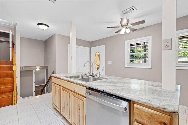 703 Townsend Cir, Chickasaw, AL 36611 - kitchen featuring stainless steel dishwasher, a sink, a ceiling fan, light brown cabinetry, and light tile patterned floors
