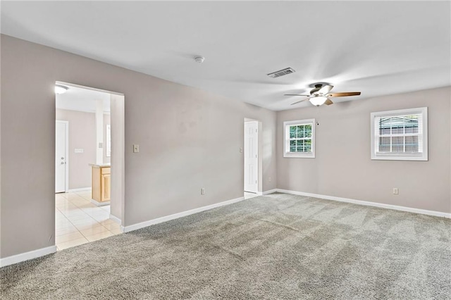 703 Townsend Cir, Chickasaw, AL 36611 - spare room with light carpet, a ceiling fan, baseboards, and a smoke detector